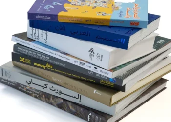 Qatar Museums display at the 34th Doha International Book Fair 2025 featuring art catalogues, history books, and children’s titles
