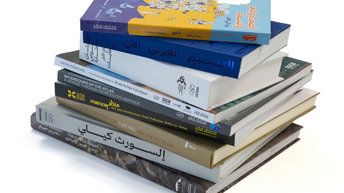 Qatar Museums display at the 34th Doha International Book Fair 2025 featuring art catalogues, history books, and children’s titles