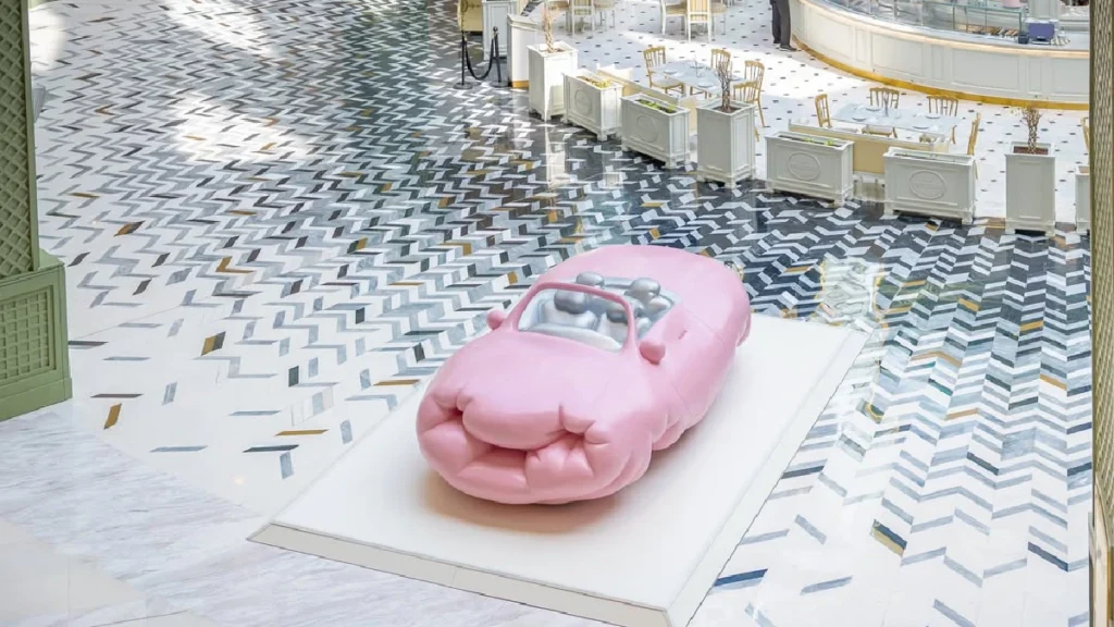 Erwin Wurm's Pink Convertible Big sculpture at Place Vendôme in Qatar